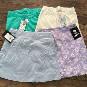 Girls Medium art class Bundle clothing. 2- skirts and 2- shorts